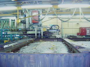 Galvanotechnik:
Unter Galvanotechnik (auch Elektroplattieren genannt) versteht man die elektrochemische Abscheidung von metallischen Niederschlgen (berzgen) auf Gegenstnden. Die Geschichte der Galvanik, wie die Galvanotechnik umgangssprachlich bezeichnet wird, geht zurck auf den italienischen Arzt Luigi Galvani, der am 6. November 1780 den nach ihm benannten Galvanismus entdeckte.
Galvanische Verkupferung eines Metalls (Me) im Kupfersulfatbad
Galvanische Verkupferung eines Metalls (Me) im Kupfersulfatbad

Bei der Galvanik wird durch ein elektrolytisches Bad Strom geschickt. Am Pluspol (Anode) befindet sich das Metall (auch Target genannt), das aufgebracht werden soll (z. B. Kupfer oder Nickel), am Minuspol (Kathode) der zu veredelnde Gegenstand (auch Substrat genannt). Der elektrische Strom lst dabei Metallionen von der Verbrauchselektrode ab und lagert sie durch Reduktion auf der Ware ab. So wird der zu veredelnde Gegenstand allseitig gleichmig mit Kupfer oder einem anderen Metall beschichtet. Je lnger sich der Gegenstand im Bad befindet und je hher der elektrische Strom ist, desto strker wird die Metallschicht (z. B. Kupferschicht).

Streng genommen wird noch zwischen der Galvanoplastik (auch Galvanoformung genannt), der elektrolytischen Herstellung von metallischen Gegenstnden, und der Galvanostegie (engl. electroplatting), der Herstellung metallischer berzge, unterschieden. Der Begriff Galvanostegie ist heute fast vollstndig durch den allgemeinen Begriff Galvanotechnik ersetzt worden. Weil immer weniger Reiterstandbilder bentigt wurden, geriet auch die Galvanoplastik etwas in Vergessenheit, erlebte aber eine kleine Renaissance im Zusammenhang mit der Mikrosystemtechnik, und zwar als Mikrogalvanoformung, auch lithografisch-galvanische Abformungstechnik genannt. Eine weitere Anwendung findet die Galvanoplastik beim Formenbau fr das Spritzgieen von Kunststoffen.
Generell wird zwischen funktionaler und dekorativer Galvanotechnik unterschieden. Letztere dient vorwiegend der Verschnerung von Gegenstnden und muss fr diesen Zweck gewisse technische Mindesteigenschaften besitzen. Beispiele fr die dekorative Galvanotechnik sind die Kunststoffgalvanisierung, die Verchromung von Stahlrohrmbeln und Motorrdern und die Vergoldung von Schmuck und Essbesteck.

Die funktionale Galvanotechnik dient dem Korrosionsschutz, dem Verschleischutz, der Katalyse oder der Verbesserung elektrischer Leitfhigkeit. Beispiele hierfr sind die Verzinkung von Schrauben, die Beschichtung von Maschinenteilen mit Hartchrom, die Herstellung von metallischen, meist nickel- oder platinhaltigen Katalysatoren fr die chemische Industrie oder Brennstoffzellen sowie die Vergoldung und Versilberung von elektrischen Kontakten. Elektrische Kontakte - so genannte Pins - aus unterschiedlichen Kupferwerkstoffen werden zumeist galvanisch verzinnt. Um zu verhindern, dass Stoffe des Grundmaterials durch die Zinnschicht hindurch diffundieren, wird vor der Verzinnung in der Regel eine Nickel- oder Kupfer-Sperrschicht aufgetragen.

Auch die Herstellung optischer Datentrger (CDs/DVDs) in einem Presswerk basiert auf Galvanotechnik.
Die Galvanotechnik kann in den Produktionsablauf eines metallverarbeitenden Betriebs integriert sein (Betriebsgalvanik) oder aber als Dienstleister,d. h. Fertigung von Auftragsarbeiten (Lohngalvanik), fungieren. Im weiteren Sinne werden auch Eloxalanlagen und andere (meist stromgetriebene) Verfahren als Galvanik bezeichnet. In der Bundesrepublik Deutschland gibt es schtzungsweise 1500 galvanische Betriebe.

Galvanische Anlagen sind in der Regel eine sehr lange Reihe von Wannen, in denen die verschiedenen Prozessschritte nacheinander erfolgen. Moderne Anlagen sind mehr oder weniger vollstndig automatisch gesteuert. Sie werden von Oberflchenbeschichtern bedient. (Die frhere Bezeichnung Galvaniseur wurde vor einigen Jahren durch Oberflchenbeschichter ersetzt)

Der Ausbildungsberuf der Galvanotechnik ist der/die Galvaniseur/Galvaniseurin. Galvaniseure bedienen die galvanischen Anlagen, die meist automatisch gesteuert werden; fr die Beschickung der Anlagen (z. B. Aufhngen der Teile, einfache Wartungsarbeiten) wird angelerntes Personal eingesetzt. Weiterfhrende Berufe sind Galvanomeister/in oder Galvanotechniker/in, beide zielen auf eine Funktion als Abteilungs- oder sogar Betriebsleiter. Das Fachhochschul-Ingenieursstudium der Oberflchentechnik beinhaltet ebenfalls einiges an Galvanotechnik.

Fachschulen fr Galvanotechnik gibt es in Schwbisch Gmnd, in Nrnberg und in Solingen.
Labortechnisch lassen sich heutzutage alle gngigen Grundwerkstoffe aus Metall sowie die meisten bekannten Nichtleiter/Kunststoffe beschichten. Bei der Kunststoffgalvanisierung/Beschichtung haben sich grotechnisch nur zwei gngige Verfahren der Polymerbeschichtung etabliert. Direktmetallisieren nach dem sog Futuron-Verfahren sowie die konventionelle Prozessreihenfolge ber Beizen aktivierende stromlose Metallisierung als erste metallische Prozessstufe- vornickel -glanzkupfer -glanznickel-chrom sind hier speziell im dekorativen Segment anzutreffen. Speziell in der Automobilbranche ist man durch hohe Qualittsmerkmale und Forderungen der Hersteller gezwungen bis zu vier verschiedene Nickelschichten im Verbund abzuscheiden, um optimale Bestndigkeit, Funktion und Aussehen zu erreichen.
 Galvanisierverfahren (berblick):
    * Anodische Oxidation (Bei Aluminium auch Eloxieren)
    * Beizen
    * Brennen
    * Brnieren
    * Chemisches Galvanisieren durch Potentialdifferenz (Aussenstromlos) oder Reduktionsmittel, siehe dazu Reduktion.
    * Chromatieren
    * Elektrolytisches Galvanisieren
    * Entmetallisieren
    * Frben von Metall
    * Gestellgalvanisieren
    * Kunststoffgalvanisierung
    * Leiterplattenherstellung
    * Phosphatieren
    * Tampongalvanisieren
    * Tauchverfahren (frher Sudverfahren)
    * Trommelgalvanisierung
    * Veralisieren
    * Vorbehandlung in der Galvanotechnik
    * Bandgalvanisieren
    * Verstahlen

Galvanische Elektrolyte:
    * Aluminiumelektrolyte
    * Antimonelektrolyte
    * Bleielektrolyte
    * Bronzeelektrolyte
    * Cadmiumelektrolyte
    * Cobaltelektrolyte
    * Chromelektrolyte
    * Eisenelektrolyte
    * Goldelektrolyte
    * Indiumelektrolyte
    * Kupferelektrolyt
    * Manganelektrolyte
    * Nickelelektrolyte
    * Nickel-Eisen-Elektrolyte
    * Palladiumelektrolyte
    * Platinelektrolyte
    * Rheniumelektrolyte
    * Rhodiumelektrolyte
    * Rutheniumelektrolyte
    * Silberelektrolyte
    * Wismutelektrolyte
    * Wolframelektrolyte
    * Zinkelektrolyte
    * Zinnelektrolyte
Quelle: www.wikipedia.org